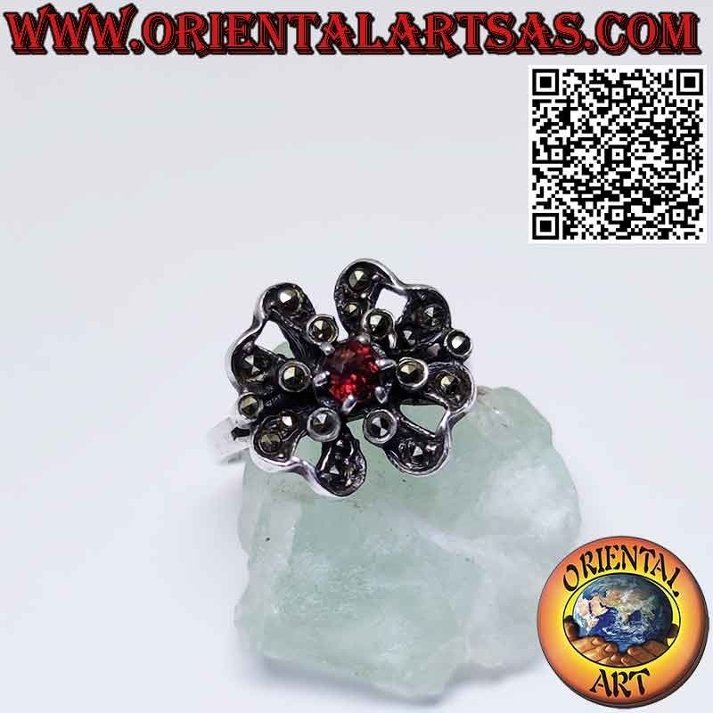 Flower silver ring with a central round garnet and marcasites