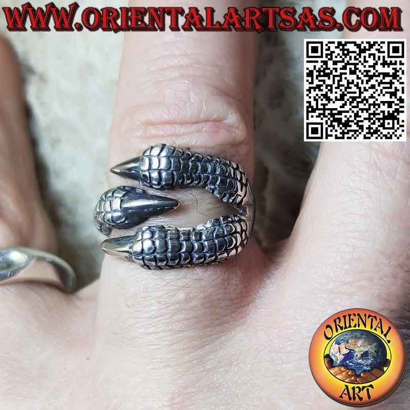 Wrapping silver ring in the shape of a rapacious eagle claw