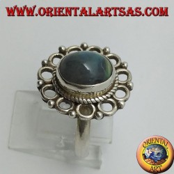 Silver ring, with oval rainbow moon stone and rim of circles