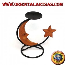 Iron candlestick with moon and star in wood
