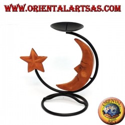 Candelero del hierro con la luna y la estrella de madera