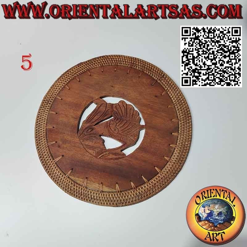 Trivet Round trivet in carved mahogany wood and wicker border