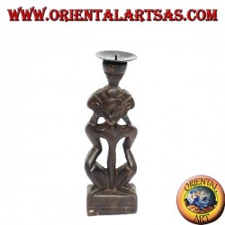 Tribal wooden statue statue in candle holder