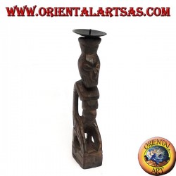 Tribal wooden statue statue in candle holder