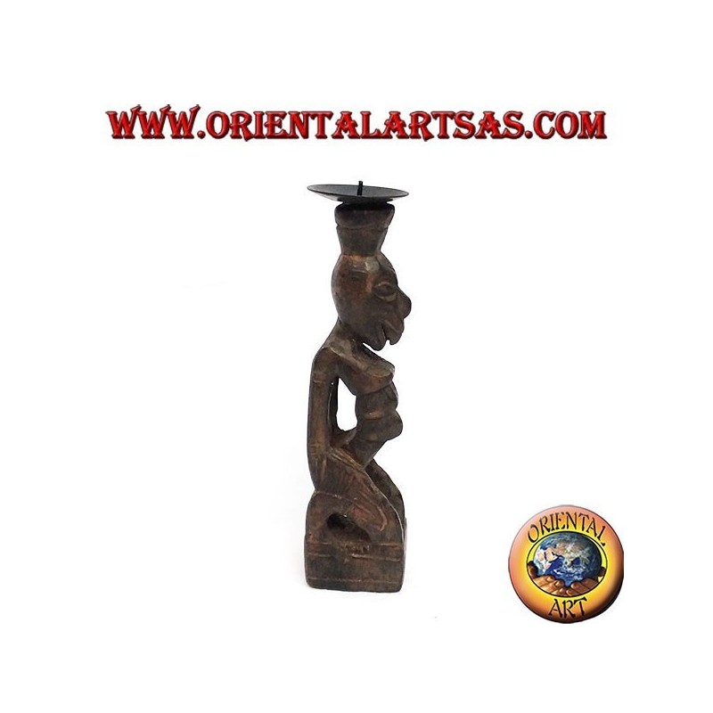 Tribal wooden statue statue in candle holder