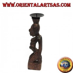 Tribal wooden statue statue in candle holder