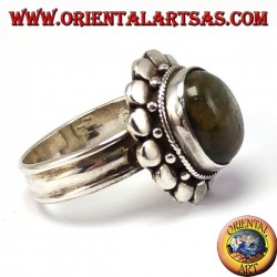 Silver ring with studded border with oval labradorite