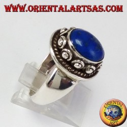 Silver ring with studSilver ring with studs around the box, with oval natural lapis lazuli