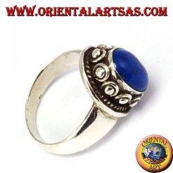 Silver ring with studSilver ring with studs around the box, with oval natural lapis lazuli