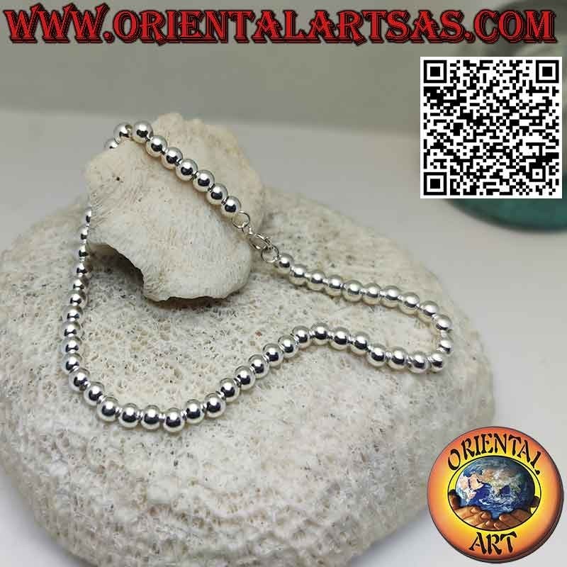 Armband aus 925 ‰ Silber mit 4 mm großen Kugeln. an einer Kette aufgereiht
