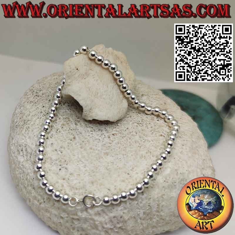 Armband aus 925 ‰ Silber mit 4 mm großen Kugeln. an einer Kette aufgereiht