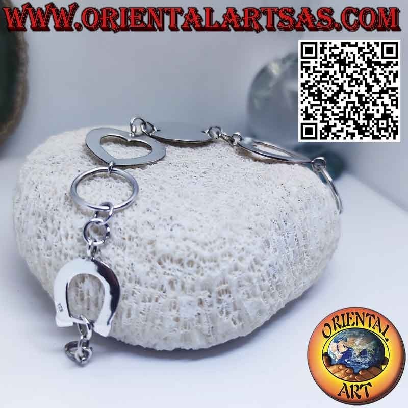 Silver bracelet with 1 round plate 2 hearts and 1 horseshoe