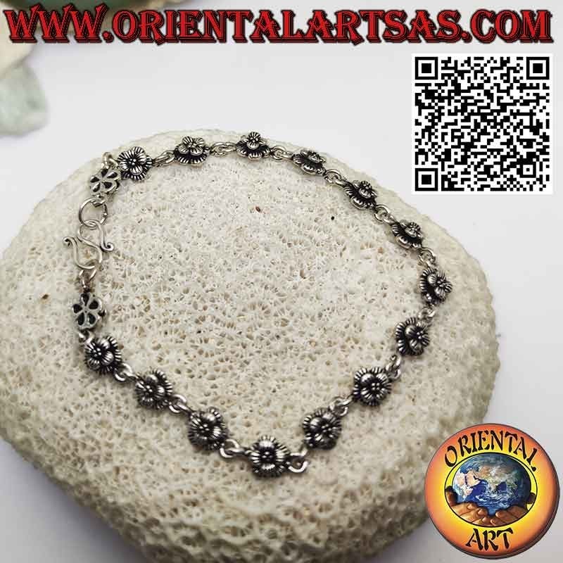 Armband mit sechzehn Rosen aus 925 ‰ Silber in Reihen, verbunden durch einen Ring
