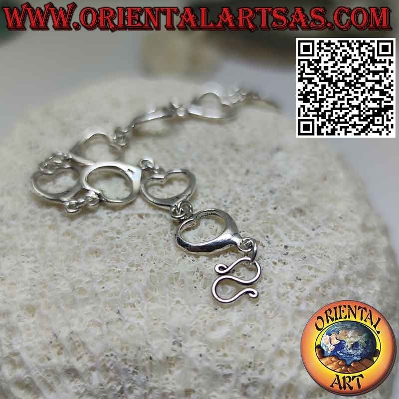 Bracelet in 925 ‰ silver with eleven hearts in a row joined by a ring