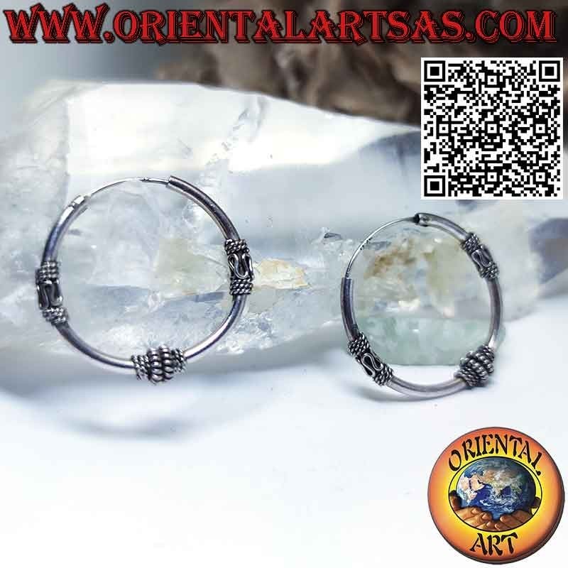 Circle silver earrings with 3 spiral and wave-worked parts