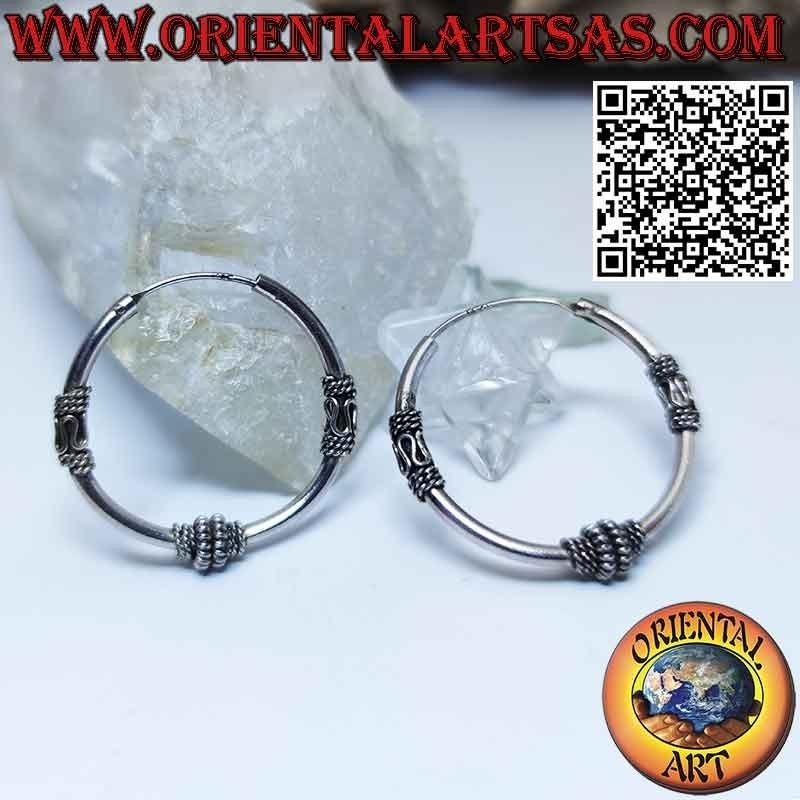 Circle silver earrings with 3 spiral and wave-worked parts