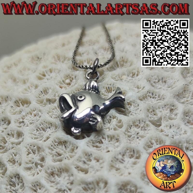 Silver pendant in the shape of a fish ball