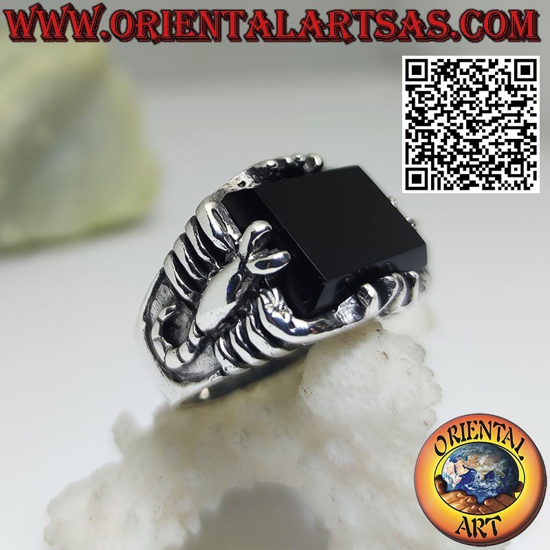 Silver ring with rectangular onyx and scorpion in high relief on the sides