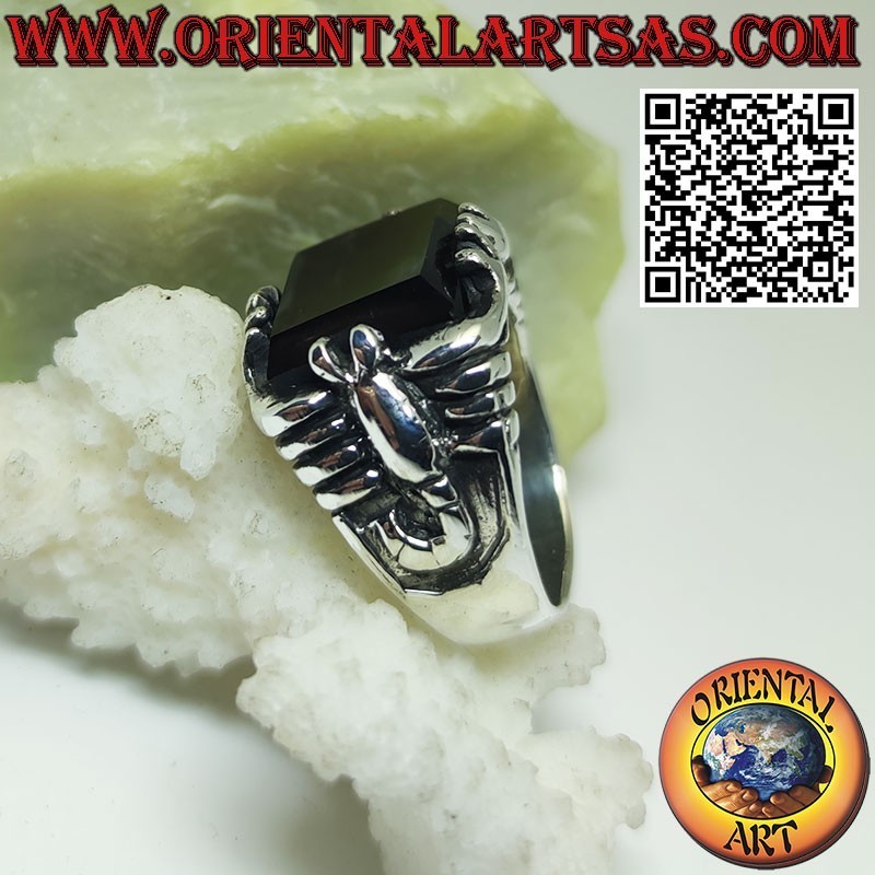 Silver ring with rectangular onyx and scorpion in high relief on the sides