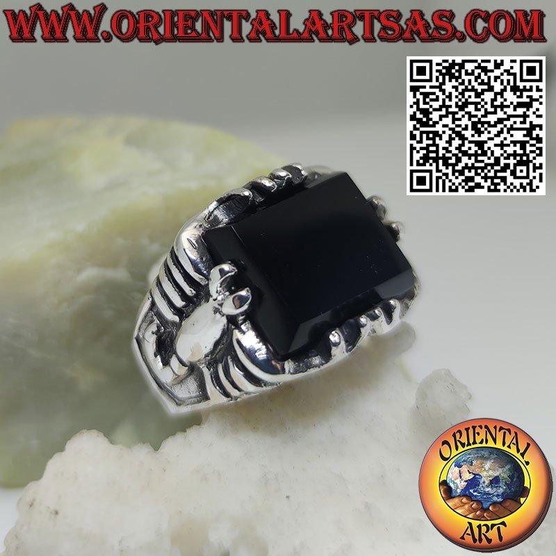 Silver ring with rectangular onyx and scorpion in high relief on the sides