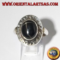 Silver ring with black star with chiselled edge
