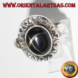 Silver ring with black star with chiselled edge