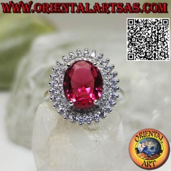 Silver ring with synthetic ruby surrounded by 2 rows of zircons