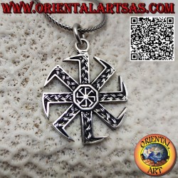Kolovrat sun wheel silver pendant with another inside