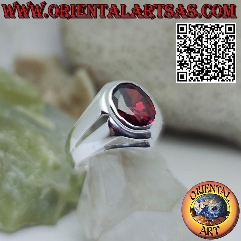 Silver ring with oval garnet and smooth setting and linear holes