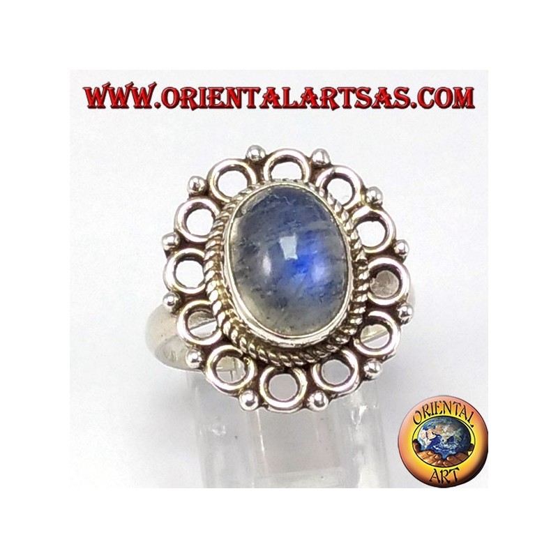 Silver ring, with oval rainbow moon stone and rim of circles