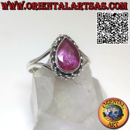 Silver ring with natural ruby drop surrounded by interweaving