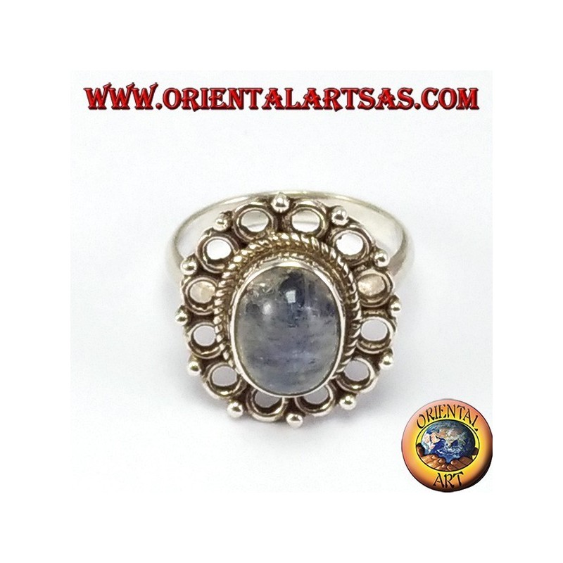 Silver ring, with oval rainbow moon stone and rim of circles