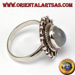 Silver ring, with oval rainbow moon stone and rim of circles