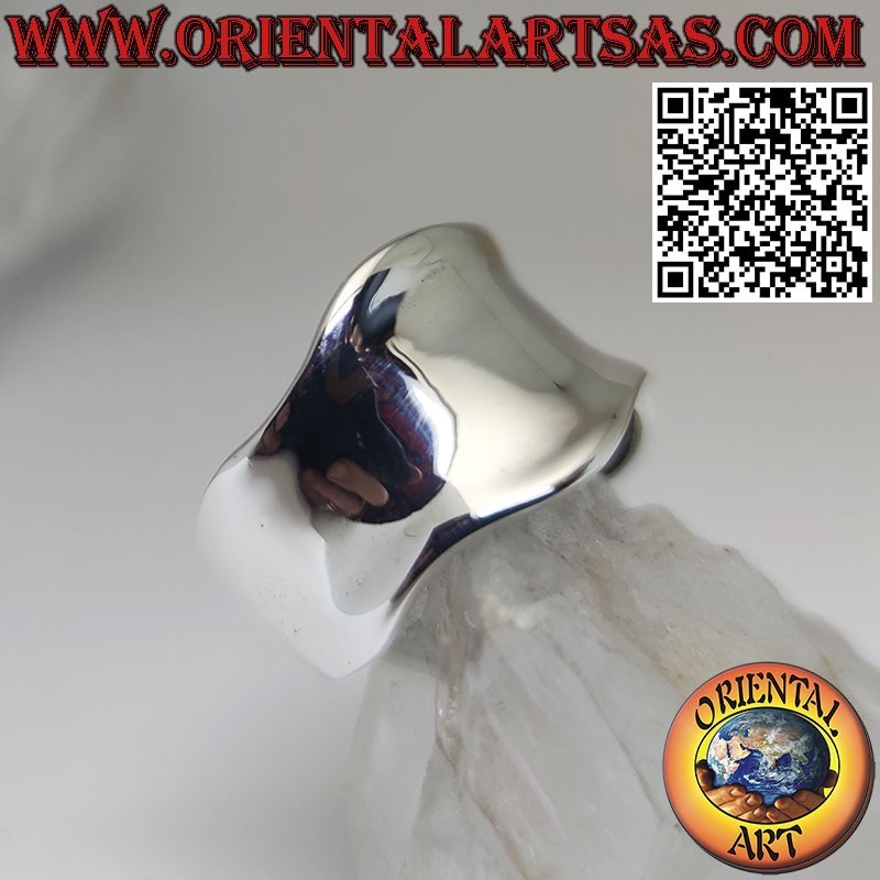 Silver ring with a wide concave and smooth band with a wavy edge