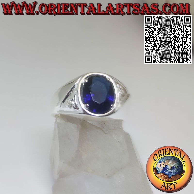 Silver ring with oval synthetic sapphire set and zircons