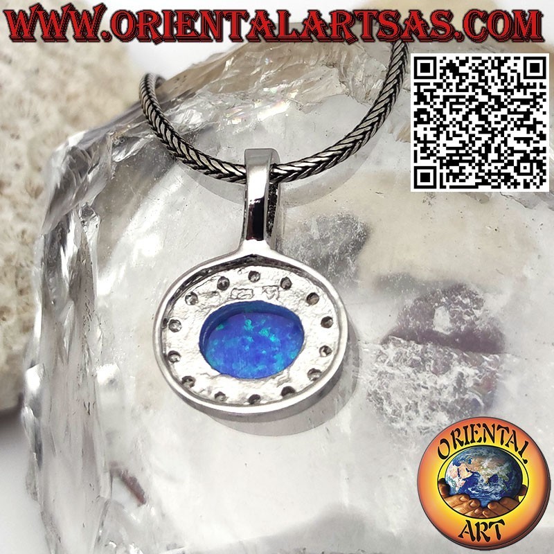 Silver pendant with transversal oval blue opal adorned with zircons