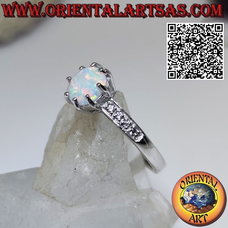 Silver ring with round harlequin opal and zircon band on the sides