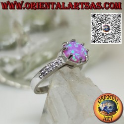 Silver ring with round pink opal set and zircon band on the sides