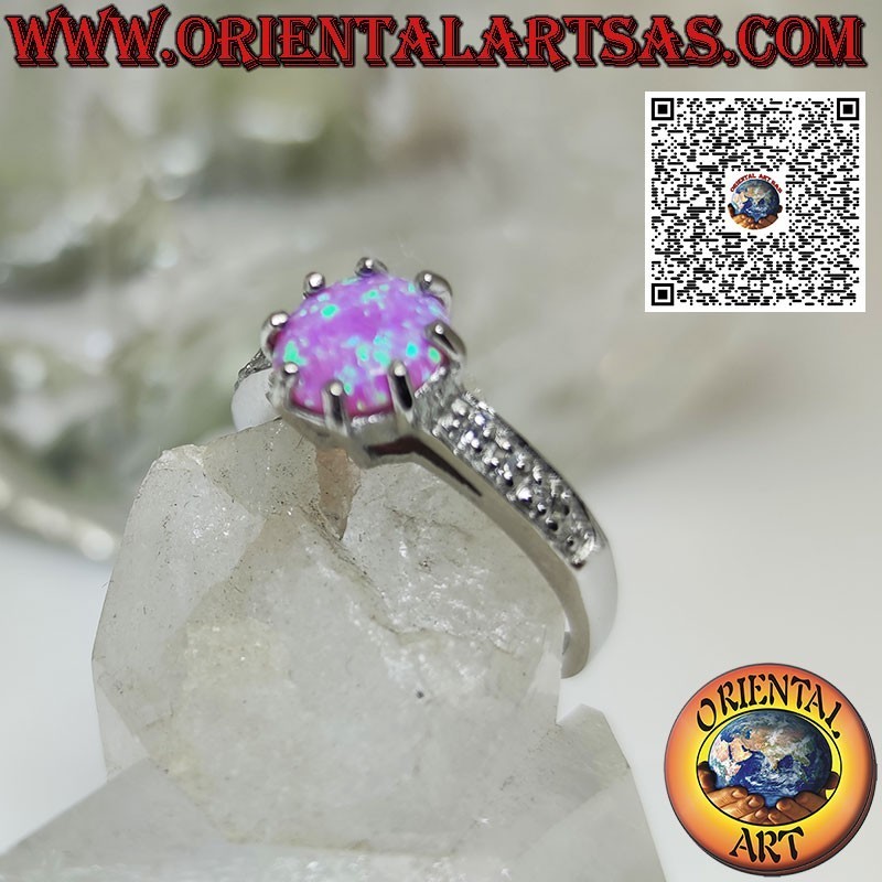 Anillo de plata con ópalo rosa redondo engastado y banda de circonitas en los laterales