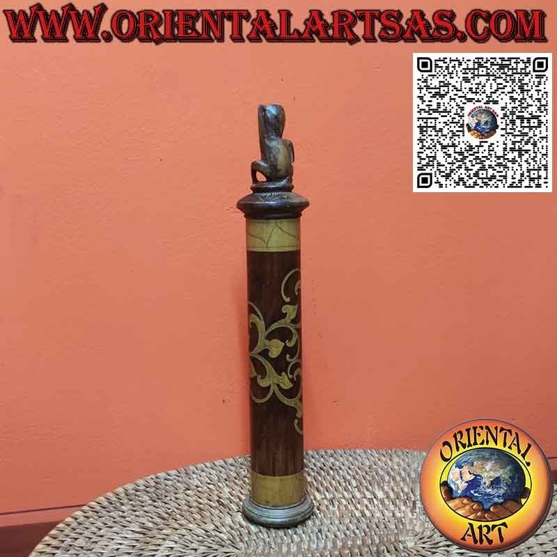 Ancient bamboo medicine container and Batak cap sculpture