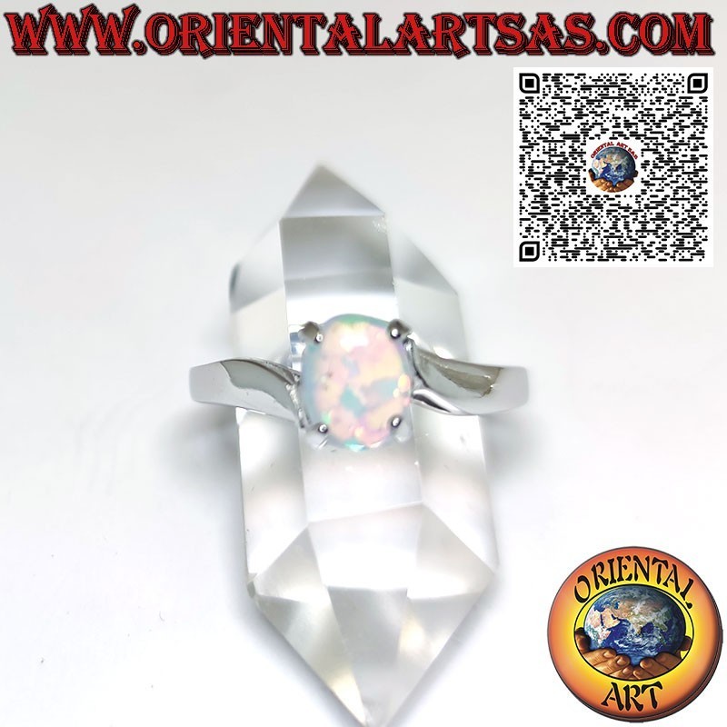 Silver ring with oval opal set on an asymmetric setting