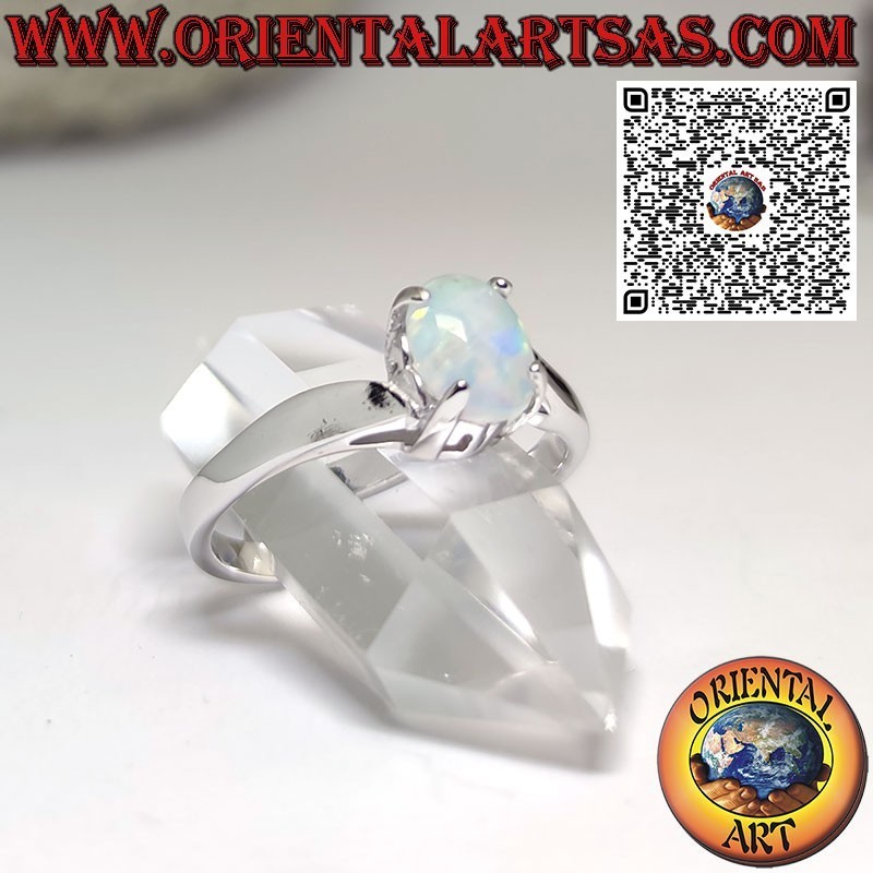 Silver ring with oval opal set on an asymmetric setting