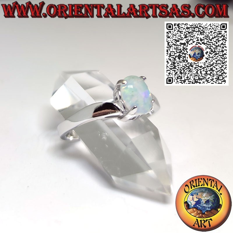 Silver ring with oval opal set on an asymmetric setting