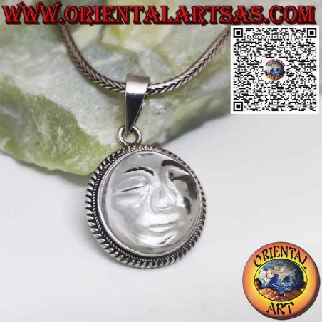 Silver sun pendant carved on rock crystal with edge