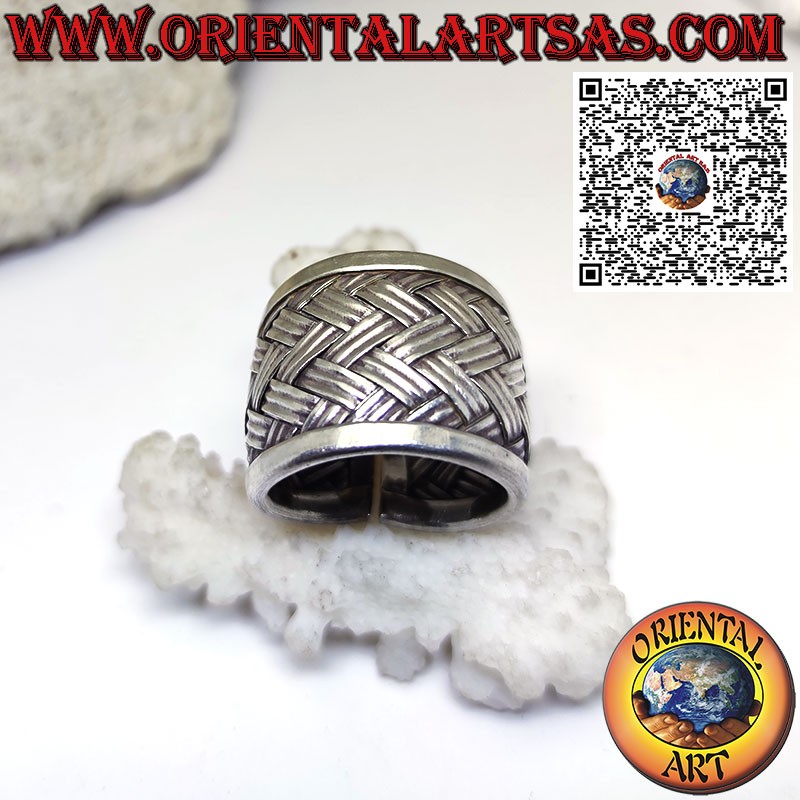 Silver ring with a wide rounded band woven by the Karen