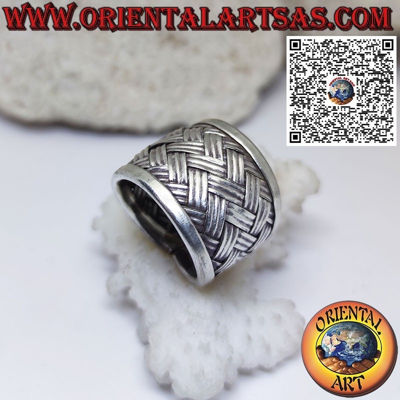 Silver ring with a wide rounded band woven by the Karen