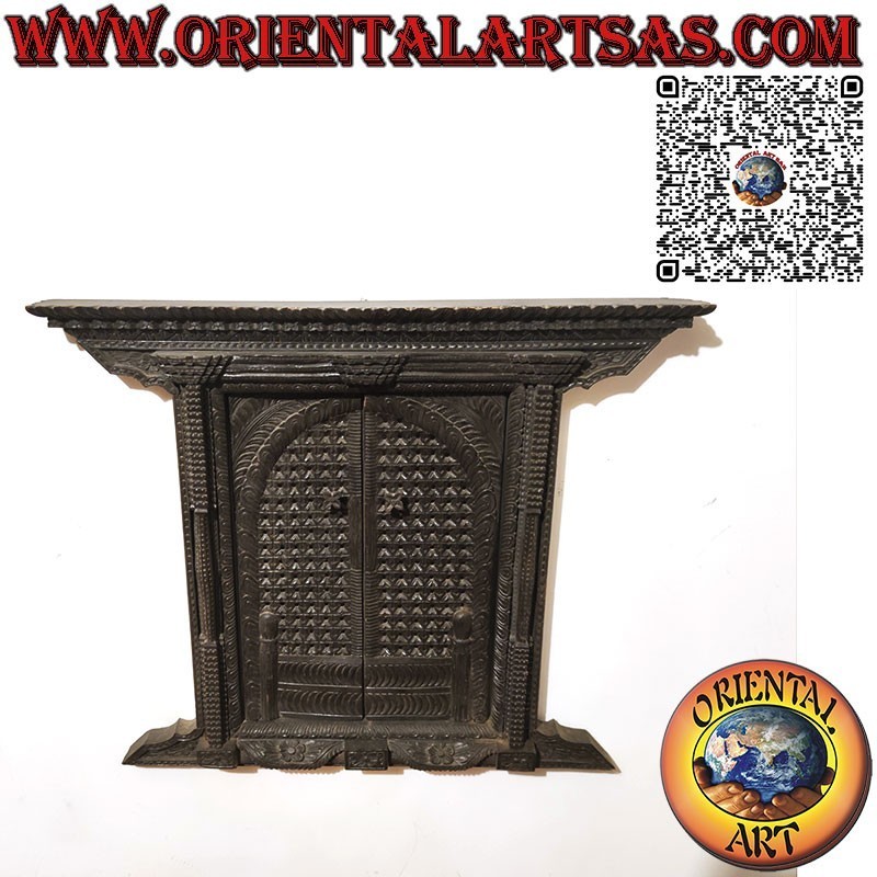 Small and ancient carved wooden 2-panel window Bhaktapur Nepal