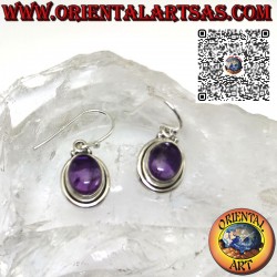 Silver earrings with oval amethyst cabochon with a simple double edge