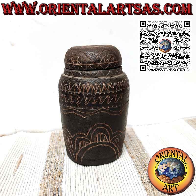 Ancient cylindrical wooden and bamboo container engraved by Dayak Borneo