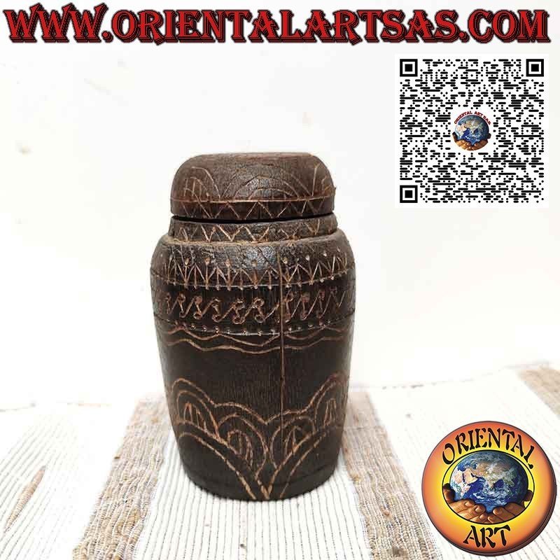 Ancient cylindrical wooden and bamboo container engraved by Dayak Borneo
